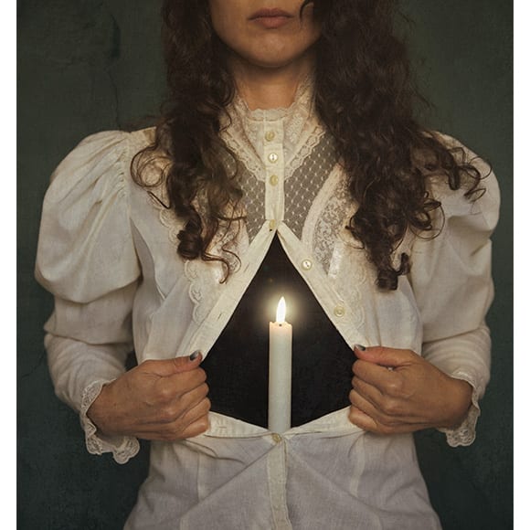 photo of person with a candle burning inside them.